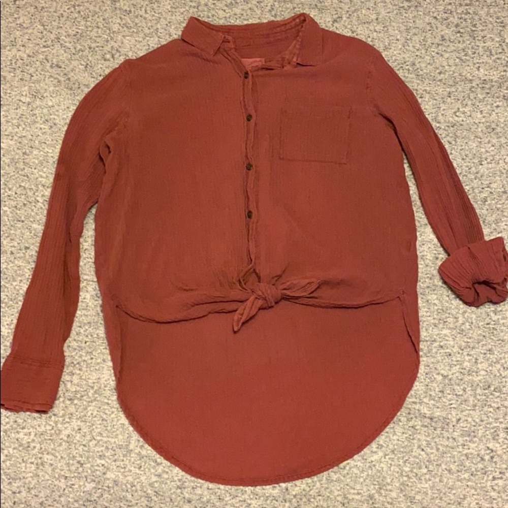 Rustic long sleeve button down blouse.